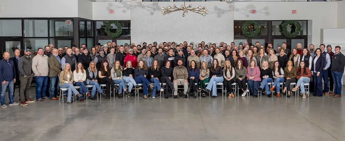 The Peoples Company team gathered for a company photograph